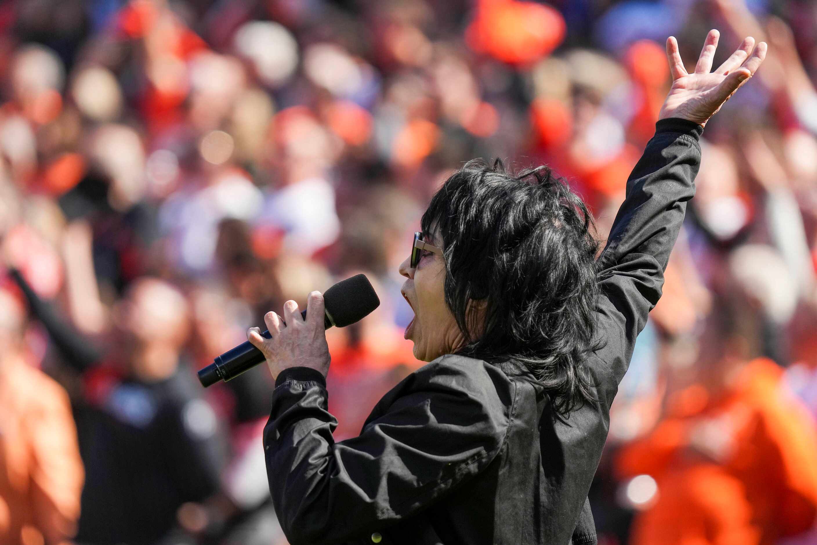 Joan Jett sings the national anthem before Game 1 of an American League Divisional Series...