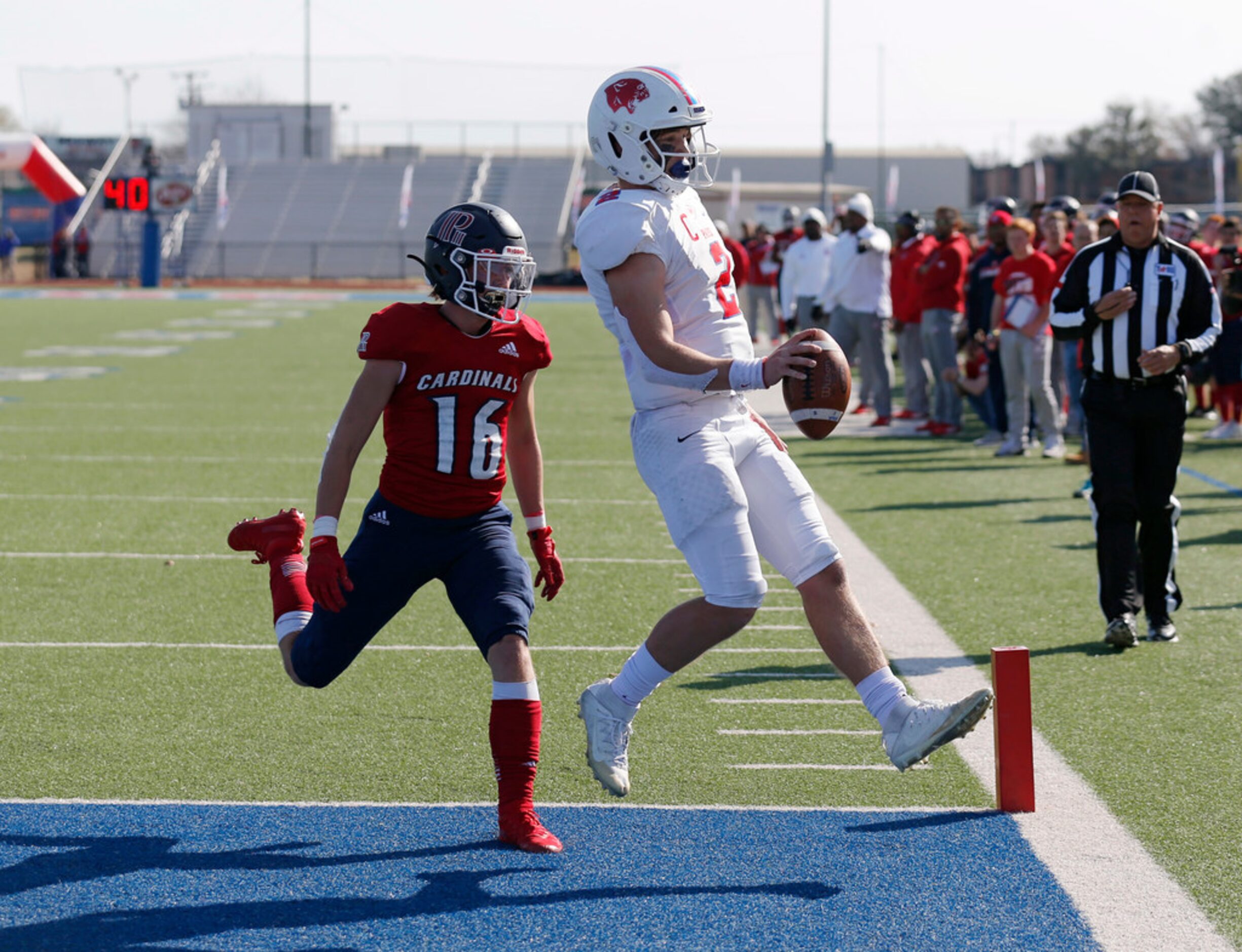 Parish Episcopal's Preston Stone (2) jumps into the end zone for a touchdown as Plano John...