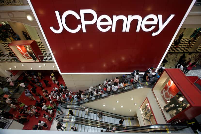 Customers are seen in the main entrance of the new J.C. Penney store in the Manhattan Mall...