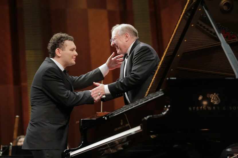 Pianist Yury Favorin and conductor Nicolas McGegan after a performance with the Fort Worth...