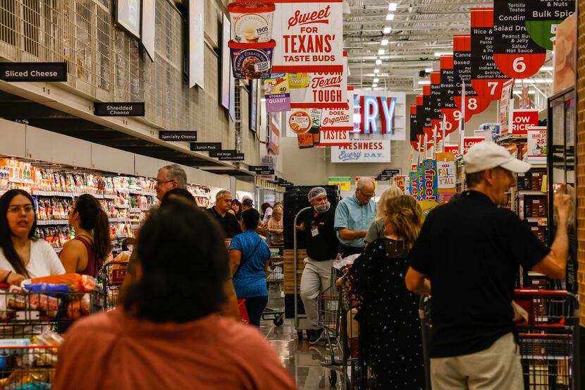 Shoppers continued to pack the aisles over the weekend of H-E-B's first namesake grocery...