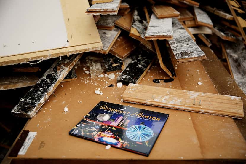 One Meyerland area family left a book titled Goodnight Houston on a heap of damaged...