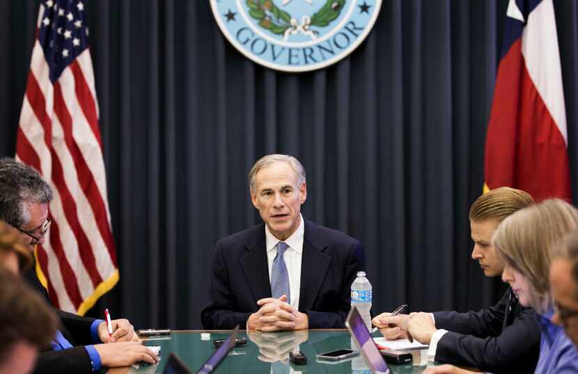 Texas Gov. Greg Abbott talks about the upcoming legislative session with reporters at the...