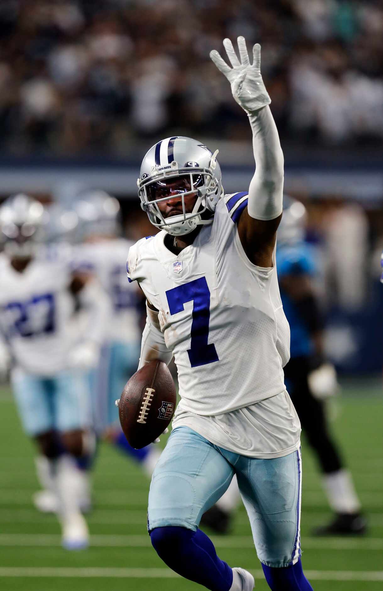 Dallas Cowboys cornerback Trevon Diggs (7) throws up a “four-interceptions” handsign after...