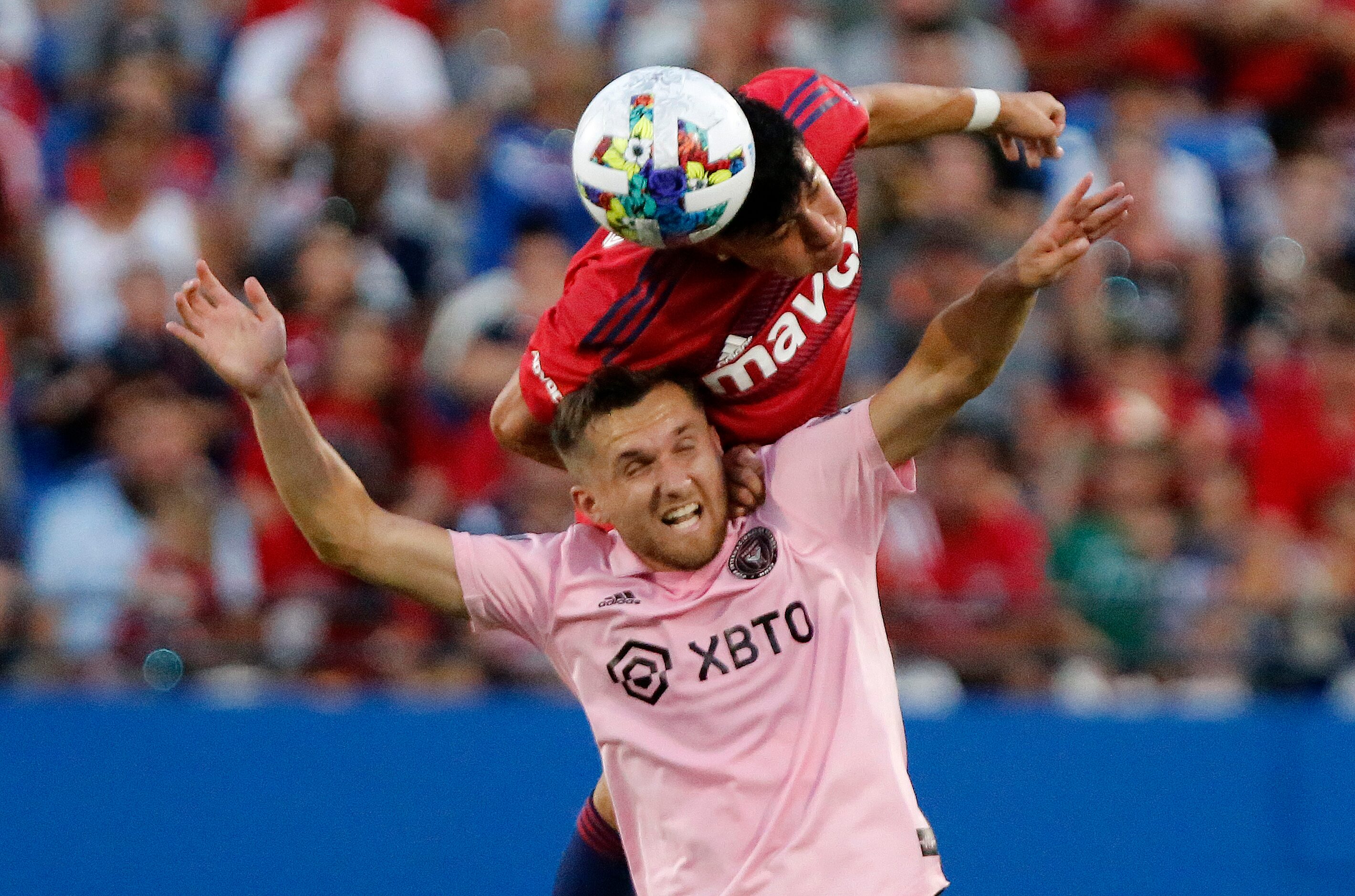 FC Dallas defender Marco Farfan (4) gets up over Inter Miami midfielder Indiana Vassilev...