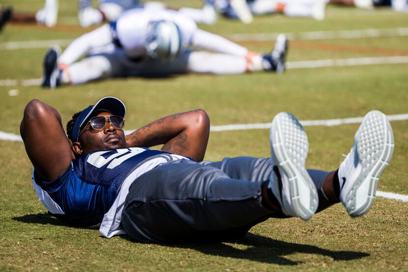 Dallas Cowboys defensive end Demarcus Lawrence (90) works out during an afternoon practice...