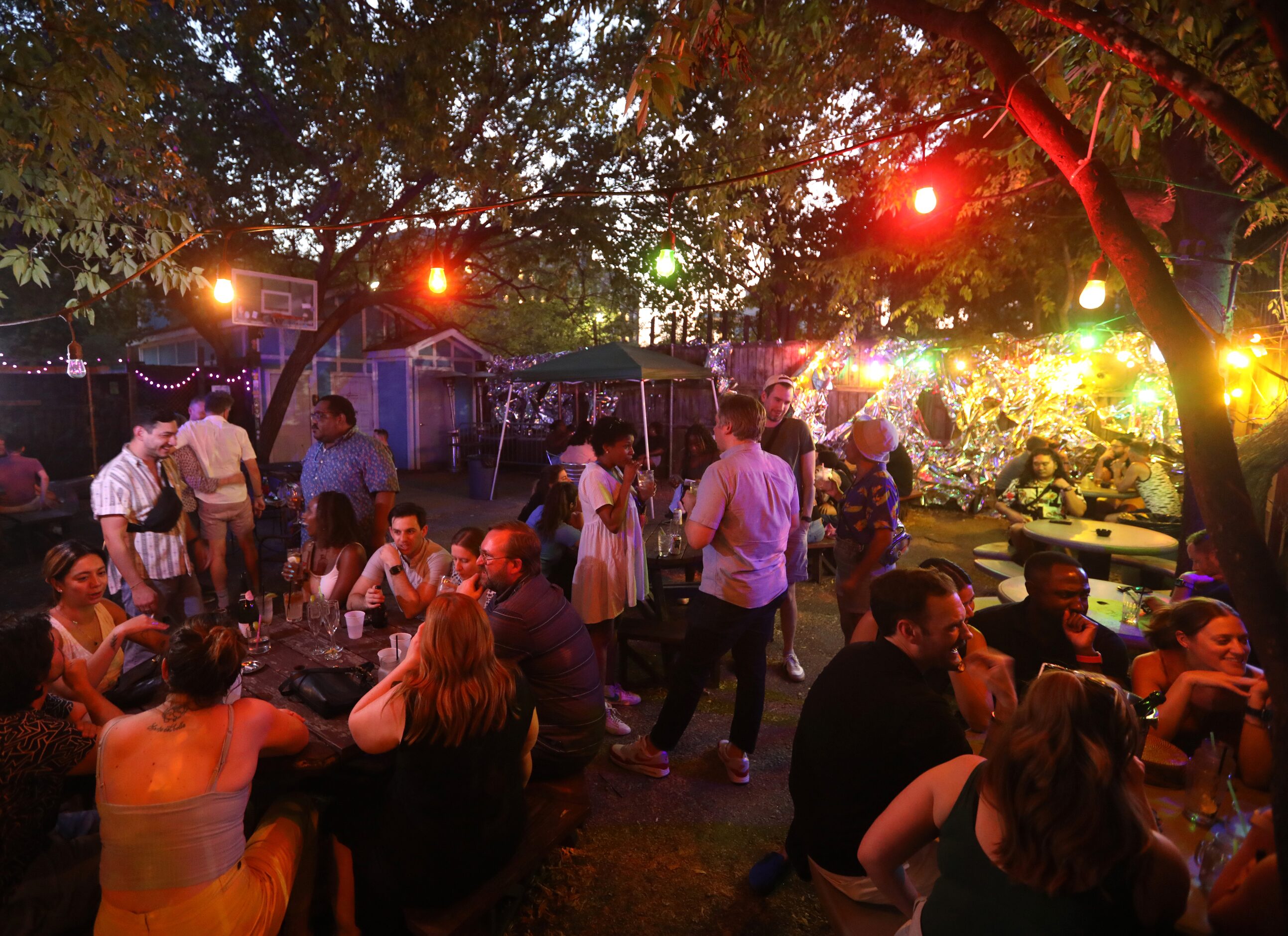 Guests enjoy one last evening at the Grapevine Bar in Dallas, TX, on Aug 23, 2023.  (Jason...