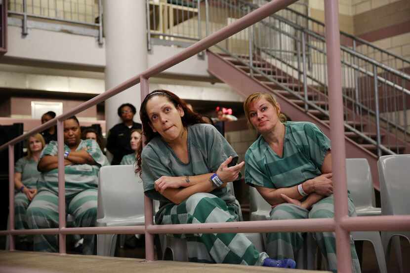 Inmate Carmen Lopez (center) and other inmates attend a program inside Dallas County Jail's...
