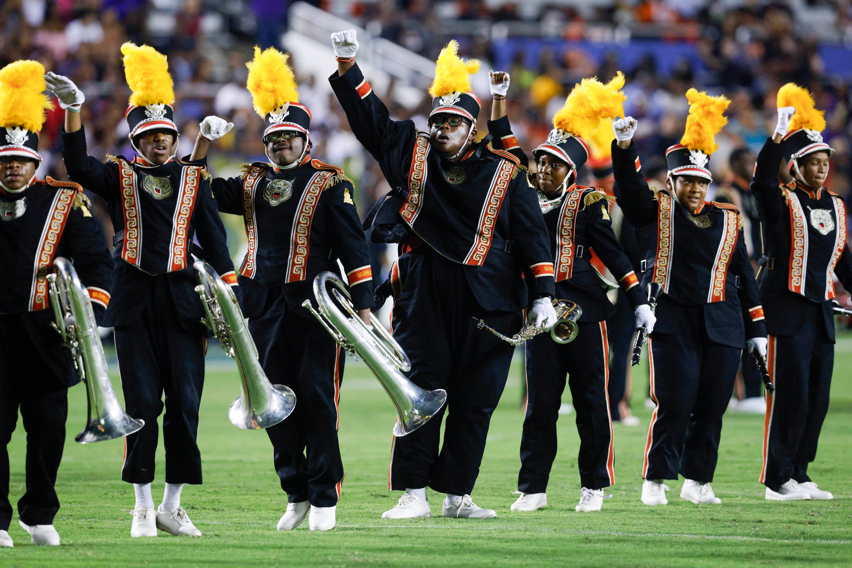 The Grambling State marching band performs during halftime of the State Fair Classic at the...