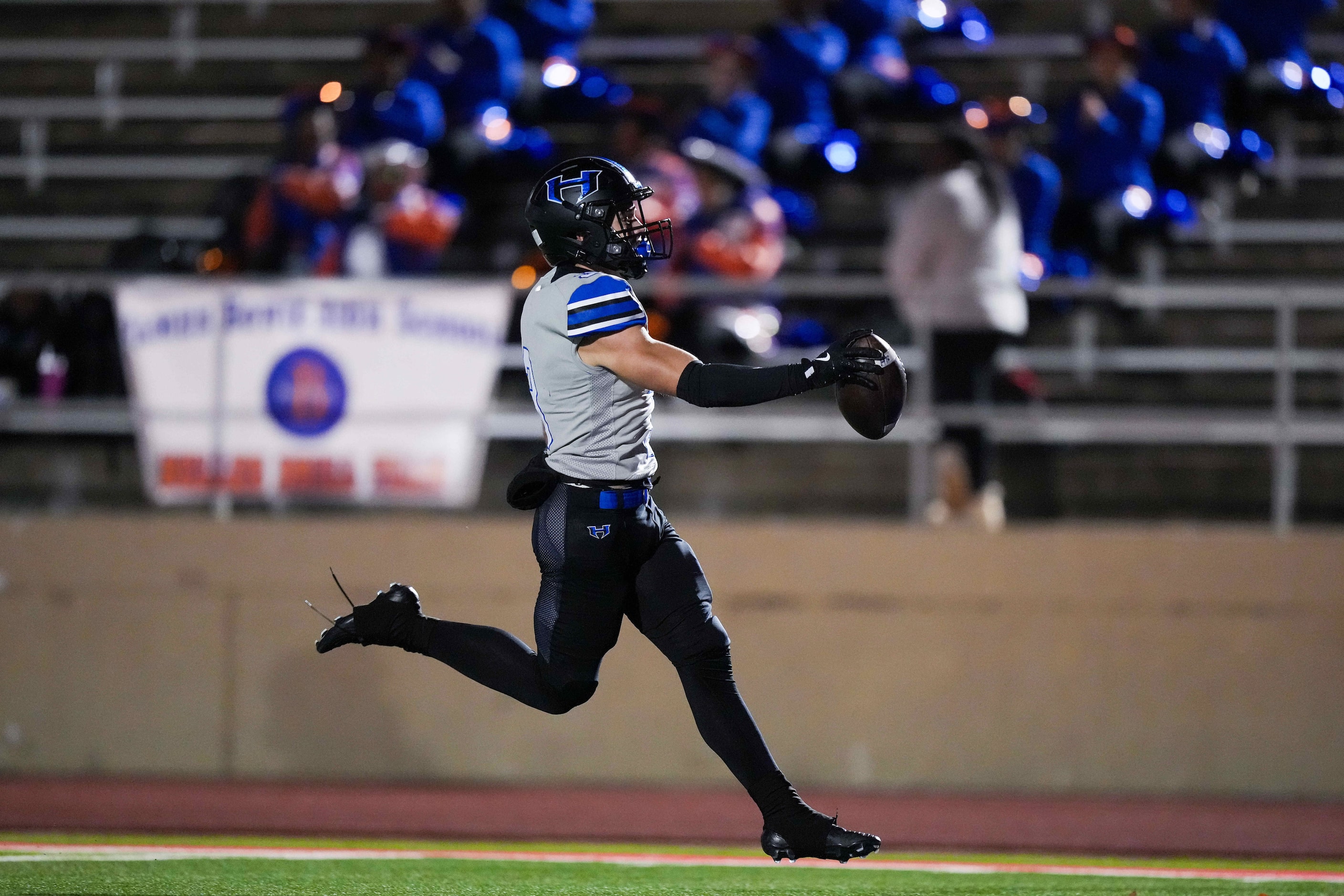 Hebron wide receiver Drew Koster (3) scores on a 67-yard pass play during the first half of...