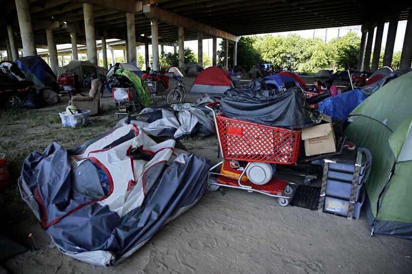 Tents are pitched and belongings put into place in 2016 as residents from Tent City find a...
