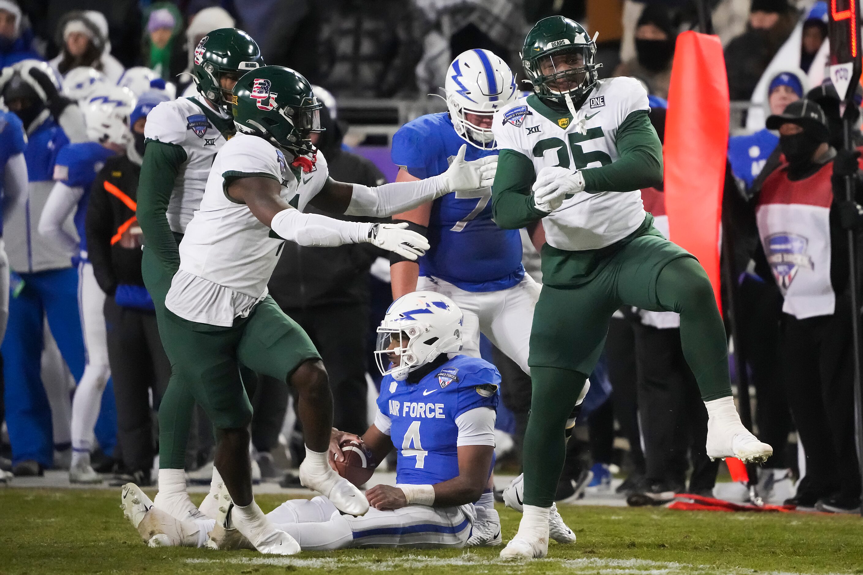 Baylor linebacker Jackie Marshall (35) celebrates after dropping Air Force quarterback...