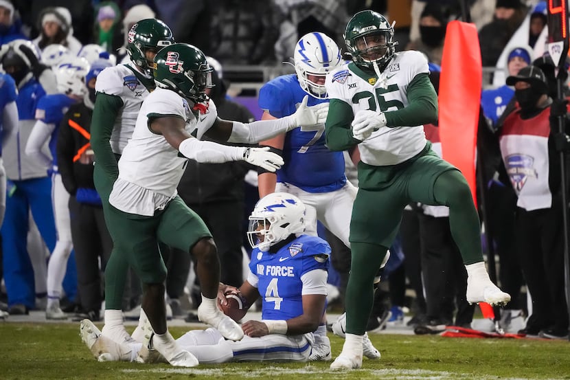 Baylor linebacker Jackie Marshall (35) celebrates after dropping Air Force quarterback...