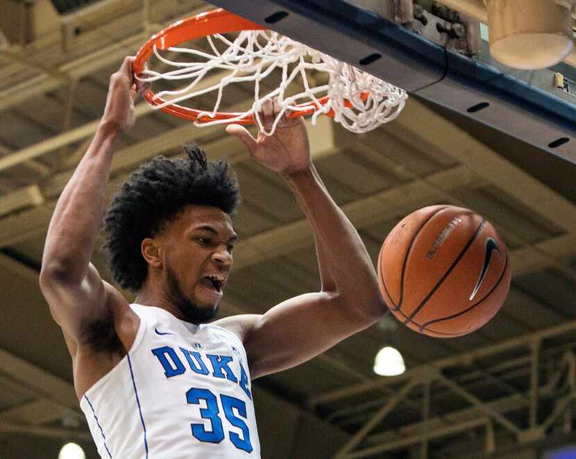 FILE - In this Jan. 27, 2018, file photo, Duke's Marvin Bagley III (35) dunks the ball...