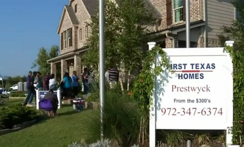 Prospective buyers lined up Tuesday to buy lots after camping overnight outside the business...