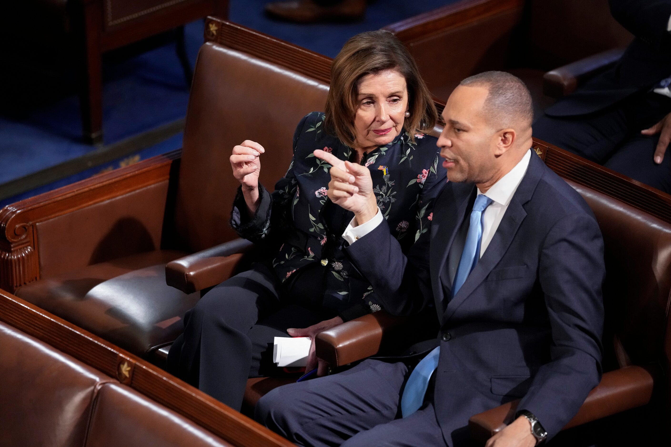 Rep. Nancy Pelosi, D-Calif., talks with Rep. Hakeem Jeffries, D-N.Y., during the 13th vote...