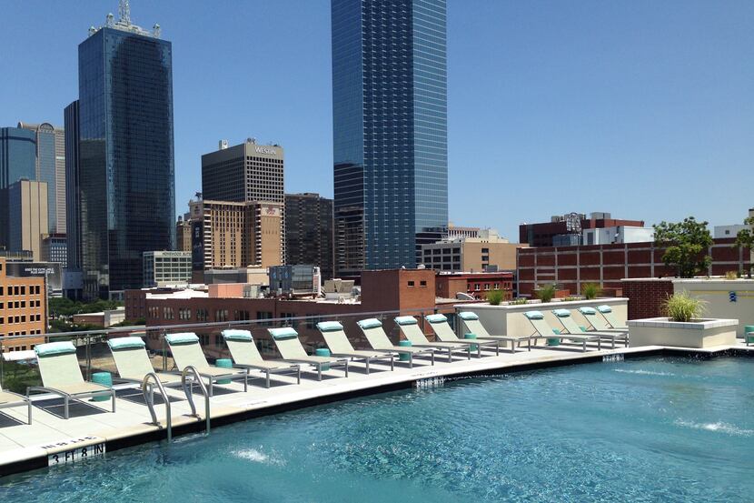Rooftop pools with skyline views are standard for the newest Dallas apartment projects.