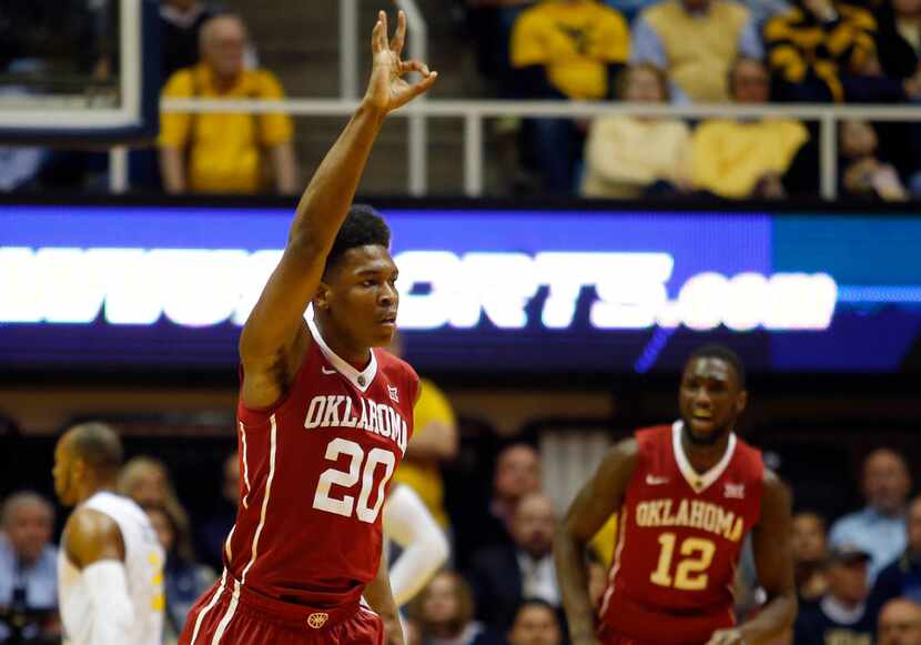 MORGANTOWN, WV - JANUARY 18:  Kameron McGusty #20 of the Oklahoma Sooners reacts after...