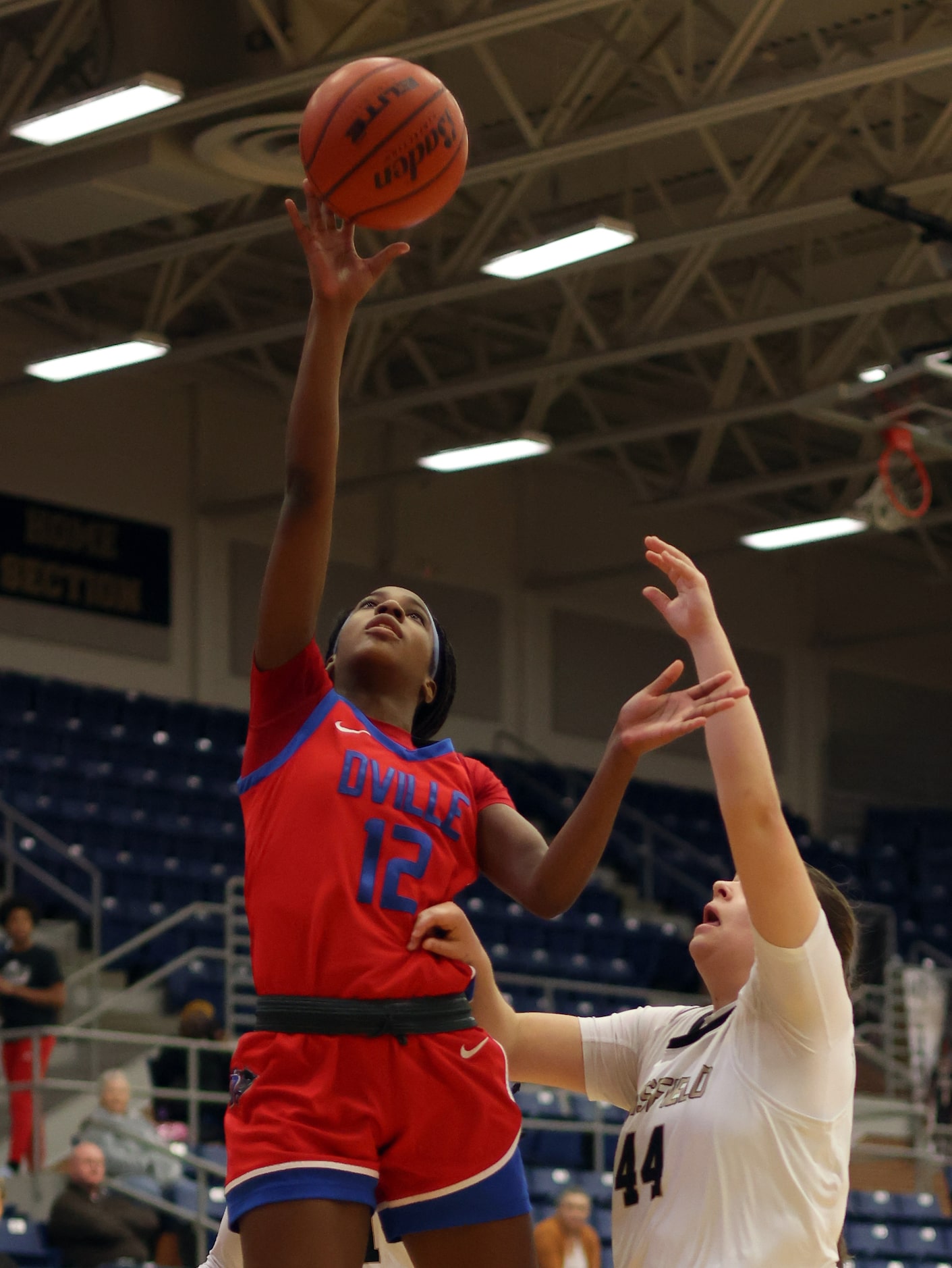 Duncanville guard Kaylinn Kemp (12) lays up two of her first half points as Mansfield...