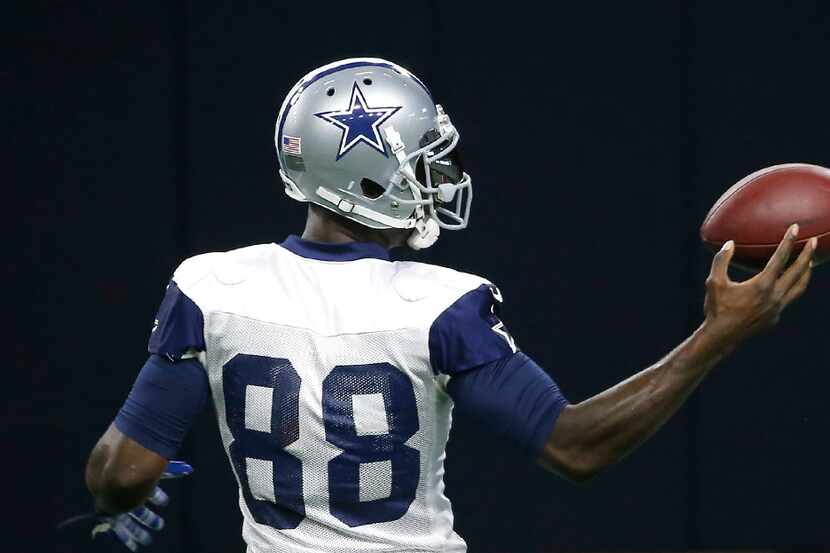 Dallas Cowboys wide receiver Dez Bryant makes an one-hand catch during practice at The Star...