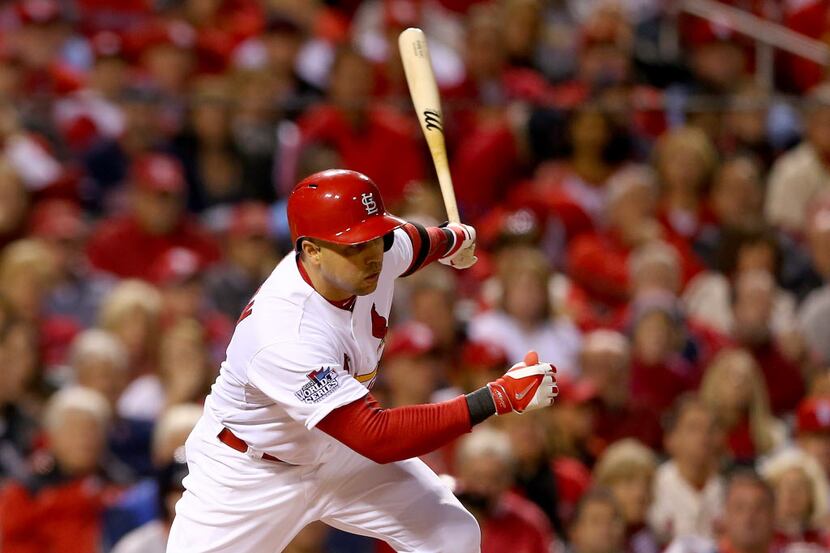 ST LOUIS, MO - OCTOBER 28:  Carlos Beltran #3 of the St. Louis Cardinals hits a single in...