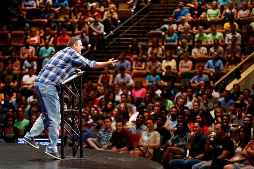 
Jonathan “JP” Pokluda,  director of young adults, grows animated as he preaches to the...