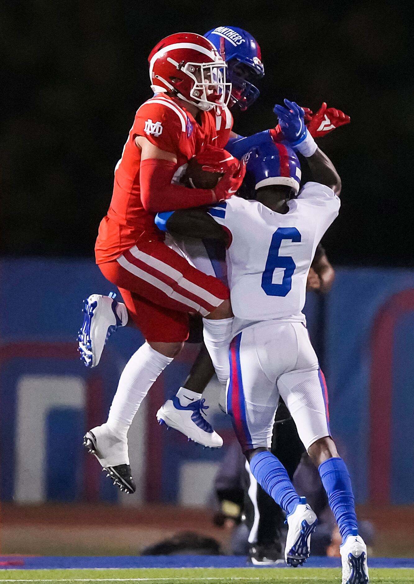 Mater Dei wide receiver Jack Ressler (88) catches a touchdown pass despite the defense from...