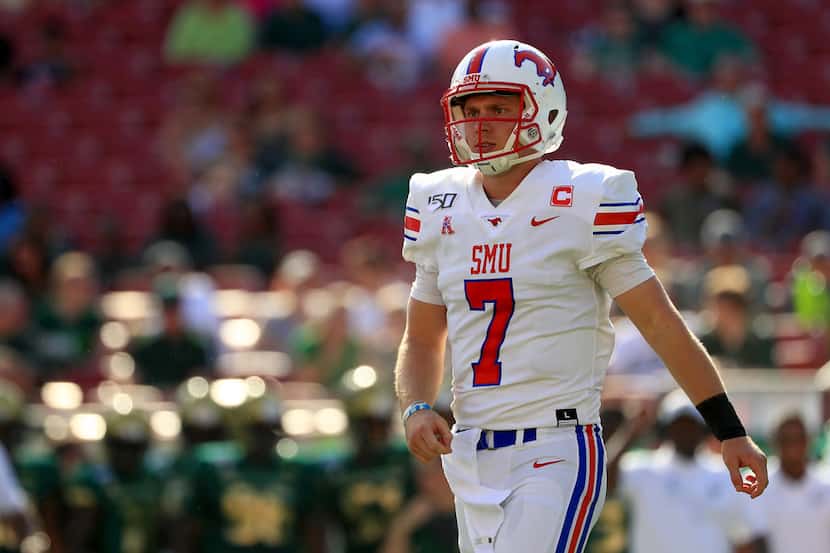 TAMPA, FLORIDA - SEPTEMBER 28: Shane Buechele #7 of the Southern Methodist Mustangs...