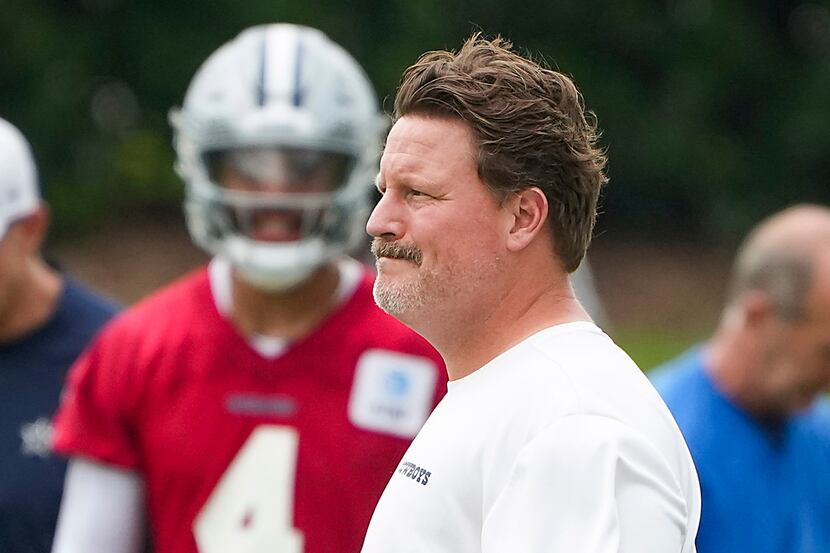 Dallas Cowboys consultant Ben McAdoo watches the team during a minicamp practice at The Star...