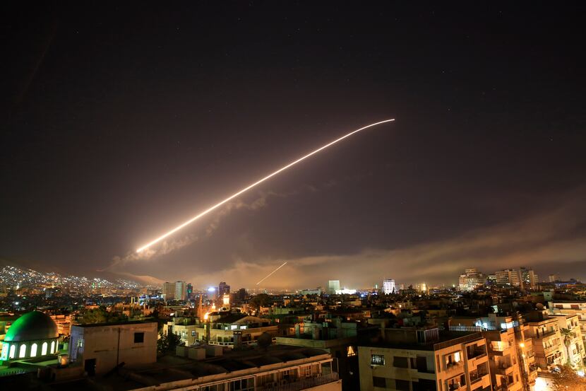 The Damascus sky lights up with missile fire as the U.S. launches an attack on Syria.