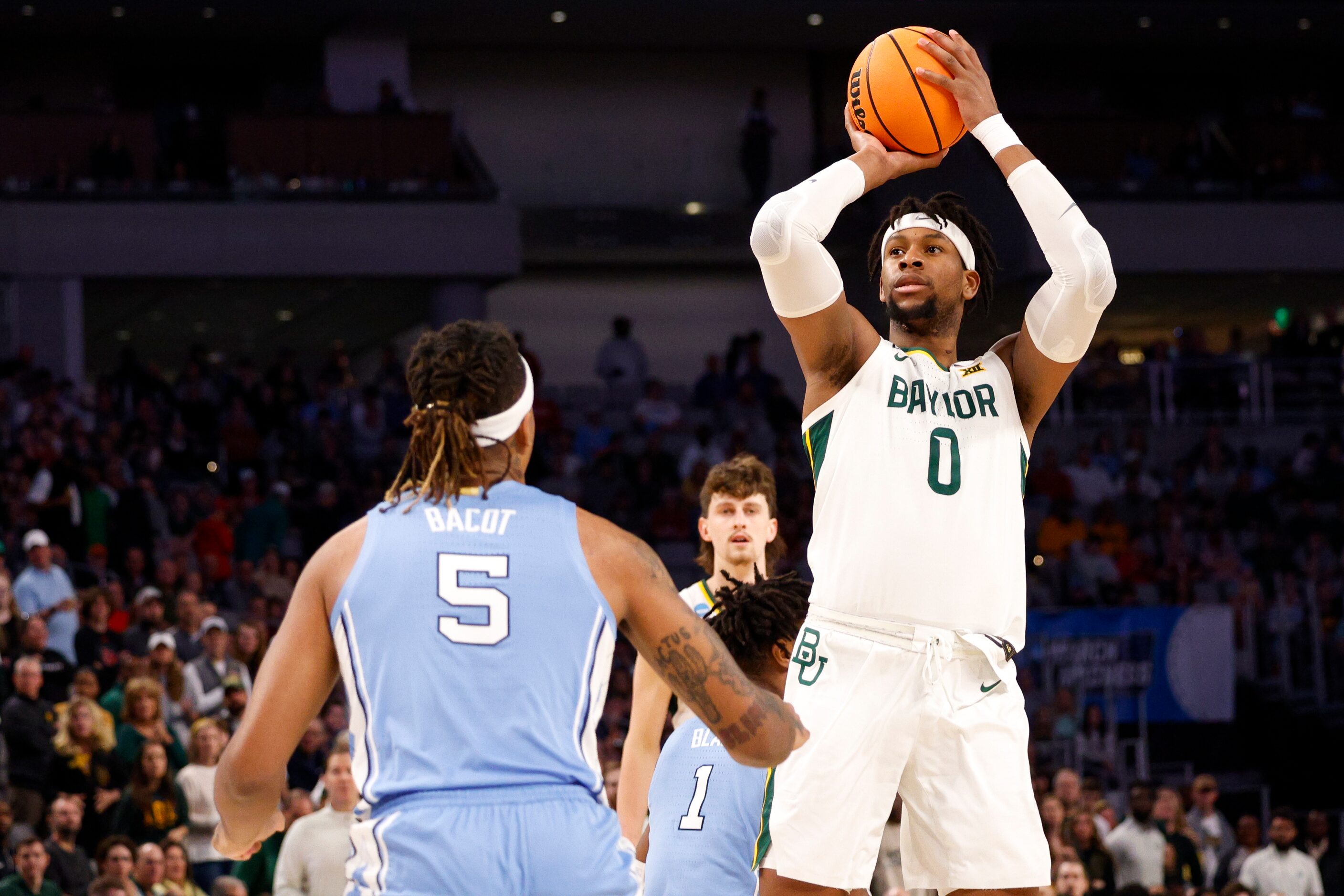 Baylor Bears forward Flo Thamba (0) shoots over North Carolina Tar Heels forward Armando...