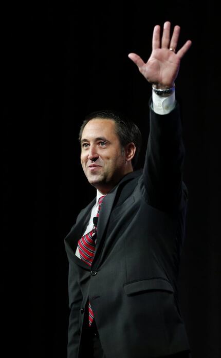 Comptroller Glenn Hegar waved to the crowd during the 2016 Texas Republican Convention at...