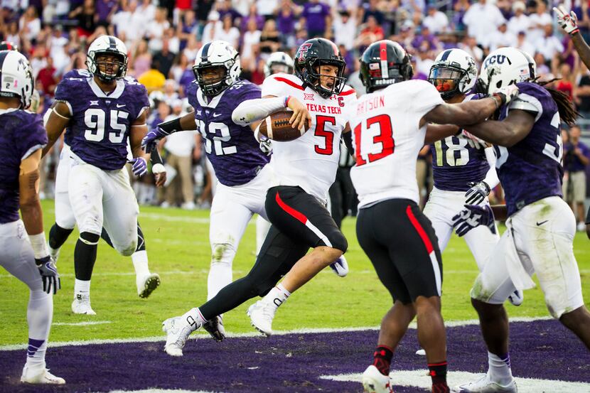 Texas Tech quarterback Patrick Mahomes II (5) scores on a 15-yard touchdown run during the...