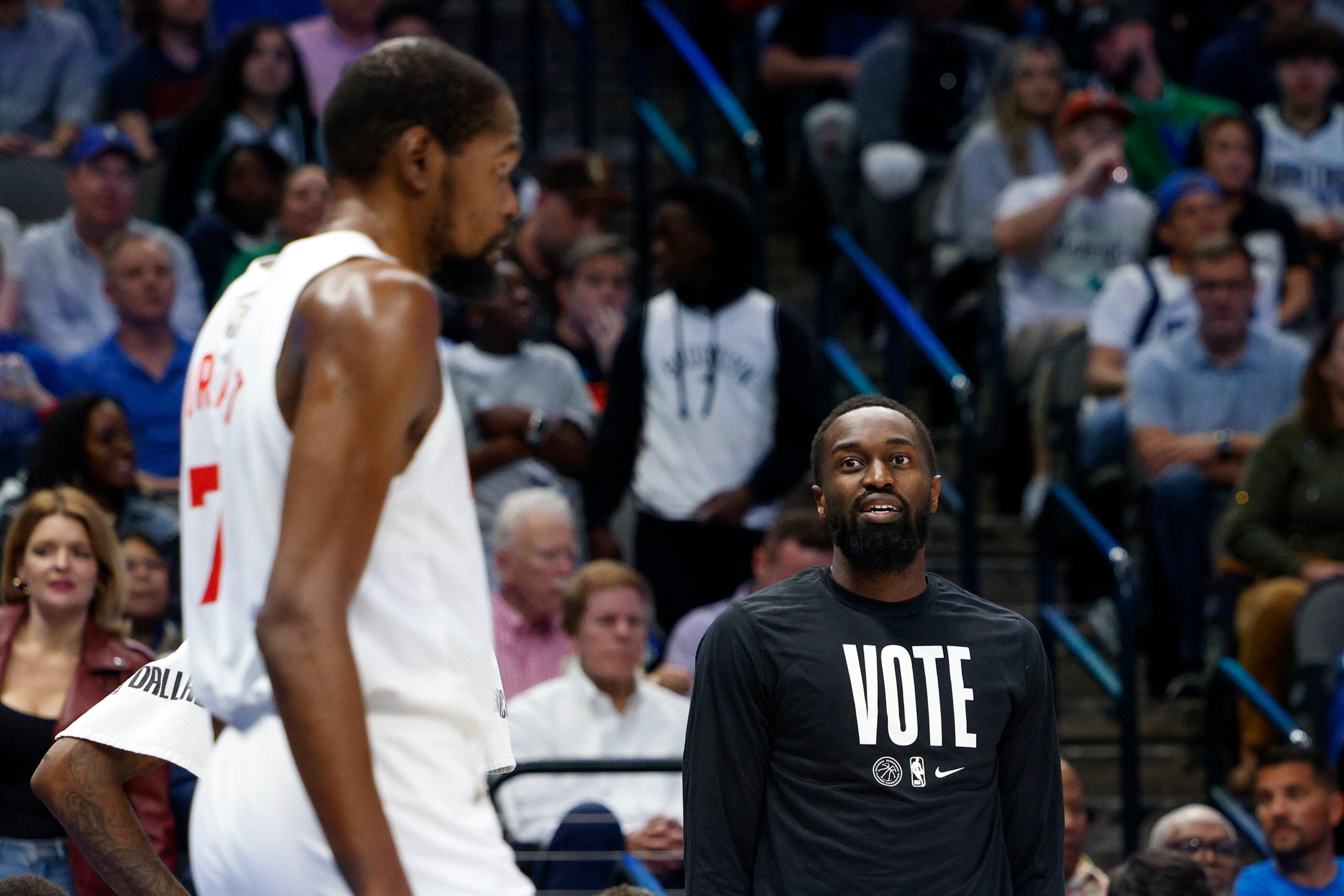 Dallas Mavericks guard Theo Pinson (1) looks towards Brooklyn Nets forward Kevin Durant (7)...