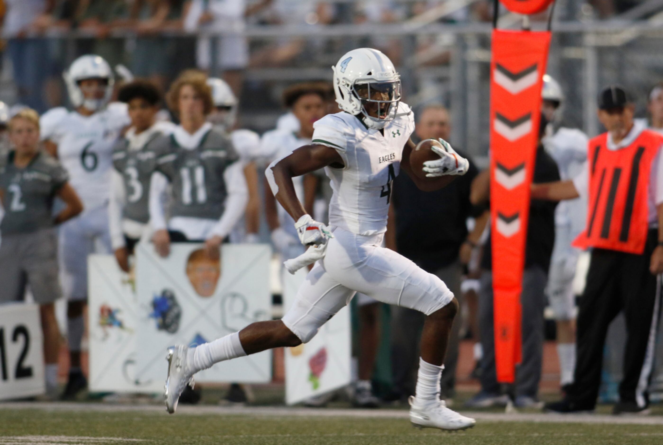 Prosper receiver Tyler Bailey (4) races deep into the Flower Mound secondary as he tacks on...
