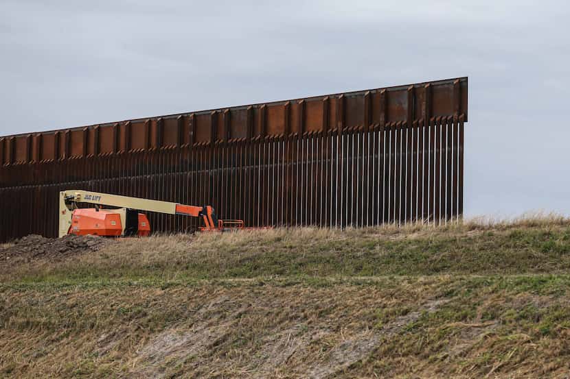 Part of the wall under construction Tuesday in Alamo near Military Highway along the border...