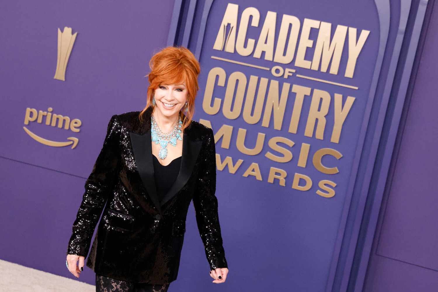 Reba McEntire arrives at the 59th Academy of Country Music Awards red carpet on on Thursday,...