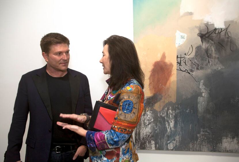 From left, Kenny Goss and Sharon Young at Instincts by artist José Parlá, the inaugural...