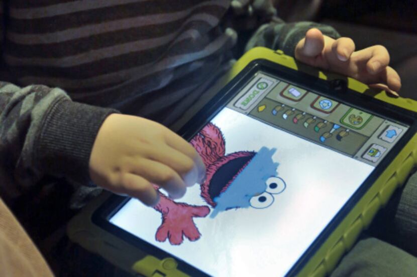Marc Cohen, 5, uses a Sesame Street app at home in New York. His dad says apps help Marc...