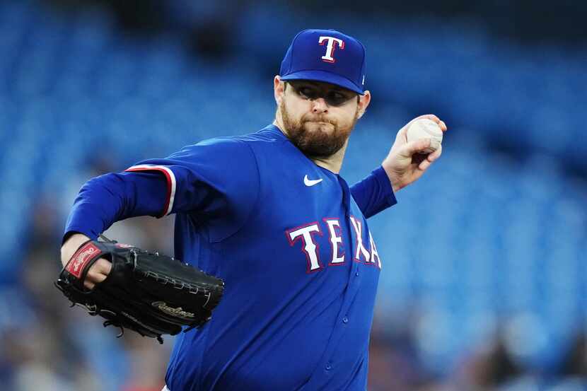 Texas Rangers starting pitcher Jordan Montgomery works against the Toronto Blue Jays during...