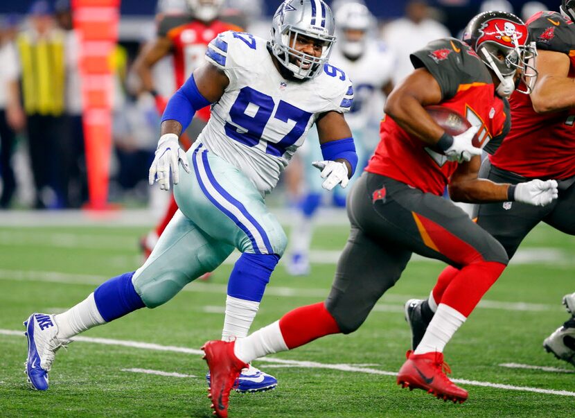 Dallas Cowboys defensive tackle Terrell McClain (97) pursues Tampa Bay Buccaneers running...