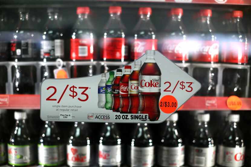 Market leader Coca-Cola saw its sales volume drop 1 percent in the annual report on soft...