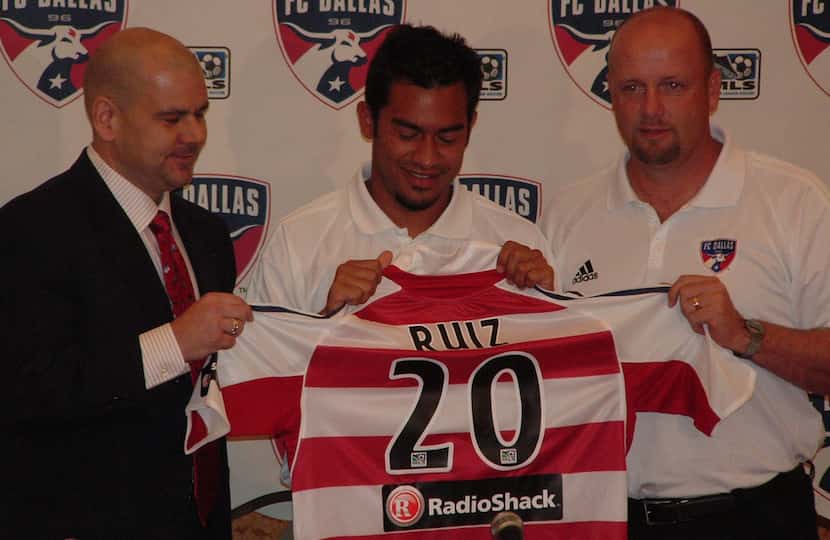 Carlos Ruiz #20 joins FC Dallas (2005).  Also pictured are then club GM Greg Elliott (left)...