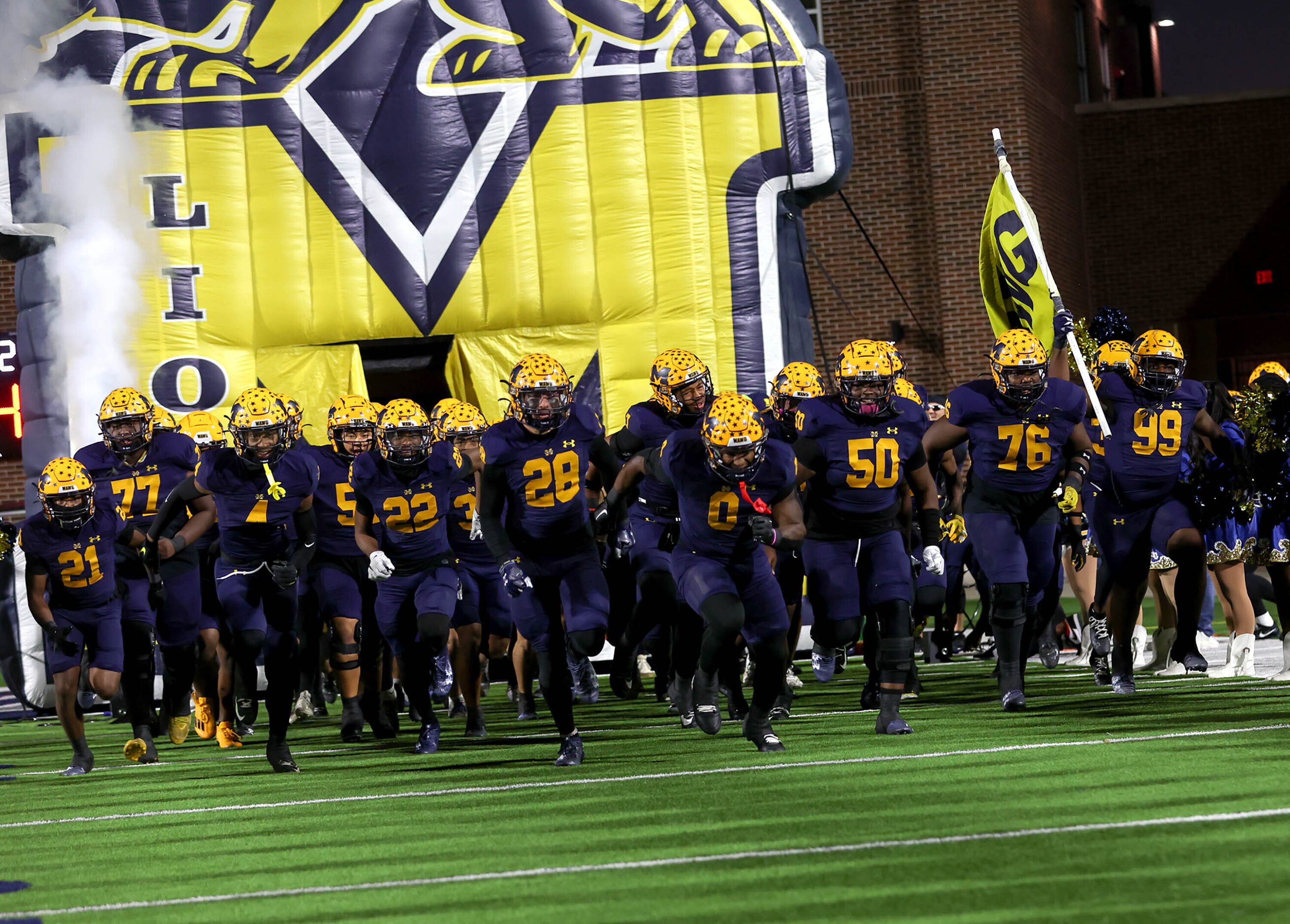 The McKinney Lions enter the field to face Prosper in a District 5-6A high school football...