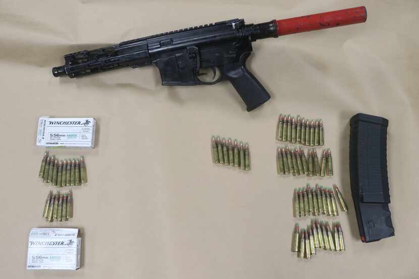 The gun and ammunition in the above photo were confiscated by authorities during a high-risk...