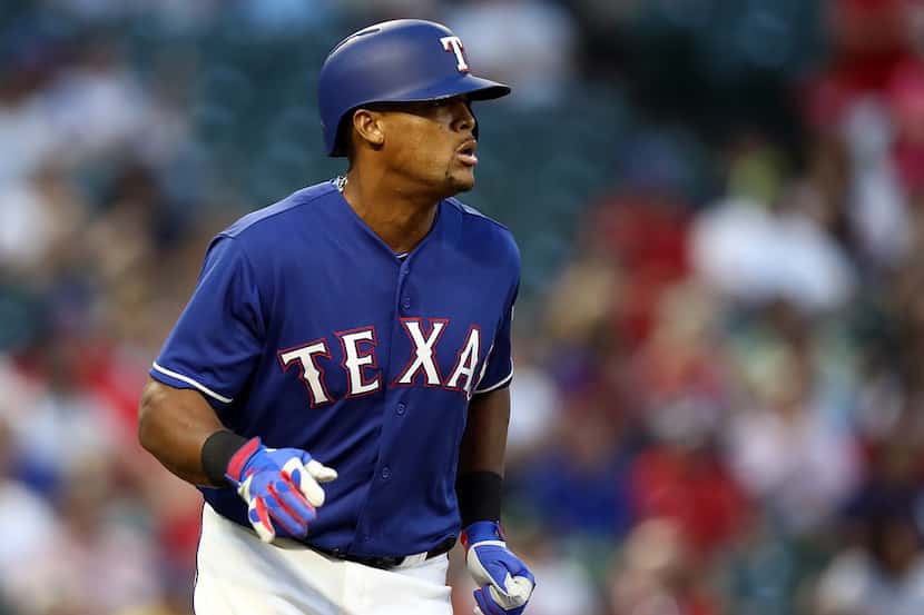ARLINGTON, TX - MAY 08:  Adrian Beltre #29 of the Texas Rangers hits a single in the fourth...