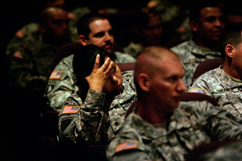 SPC Sherry Ramirez (center ) and other soldiers attend Lifelines, a mandatory suicide...
