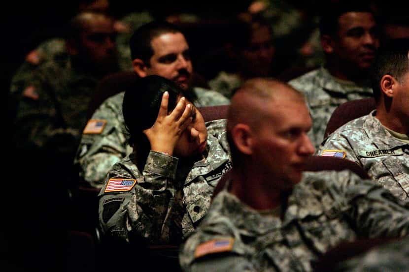 SPC Sherry Ramirez (center ) and other soldiers attend Lifelines, a mandatory suicide...