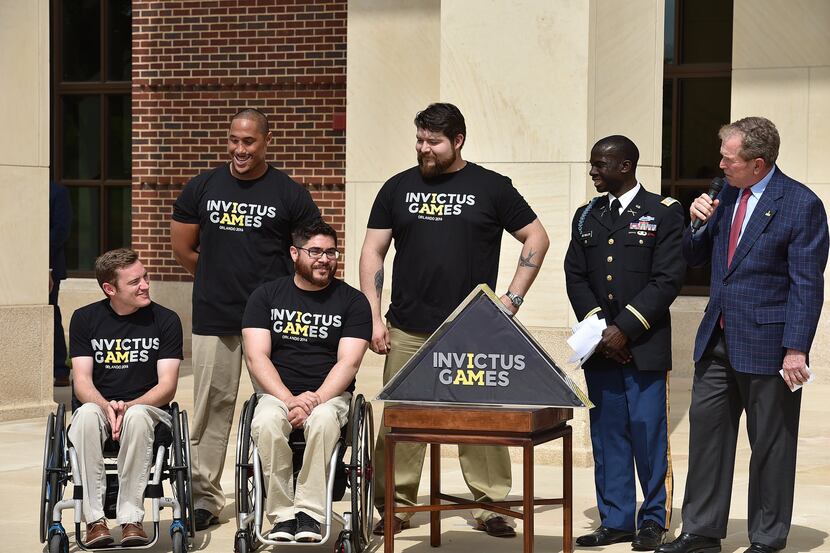  President George W. Bush, Honorary Chairman of Invictus Games Orlando 2016, was presented...
