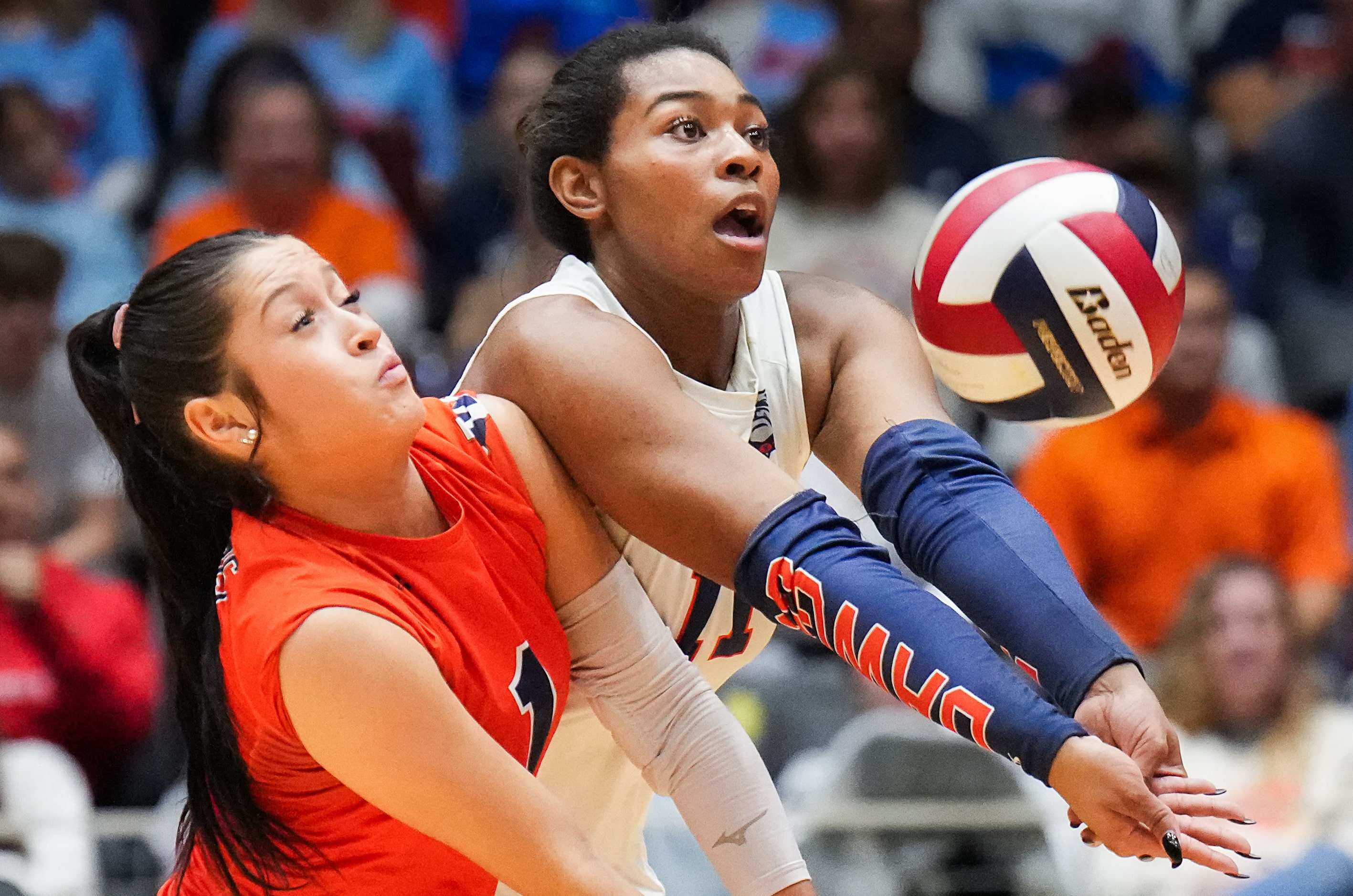 McKinney North's Gabi Rodriguez (left) and Chloe Lewis collide as they go for a dig during...